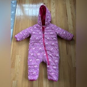 Hatley baby pink dear snowsuit with fold in hands and feet
